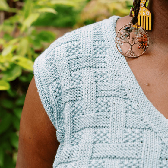 Calme Top - Mouwloze Top in Mandensteek
6