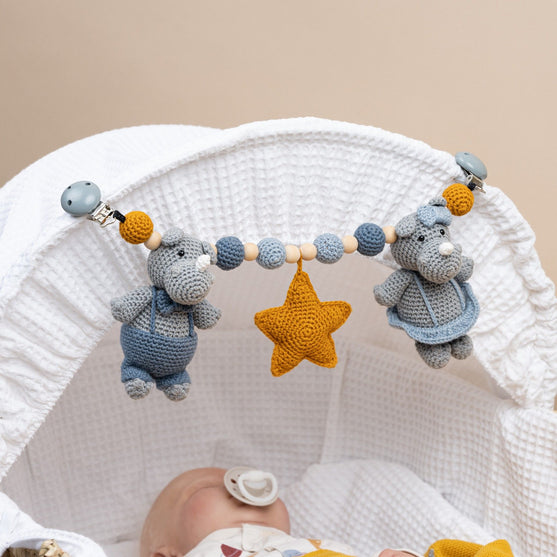 Hollie en Herman - Kinderwagenspanner
7
