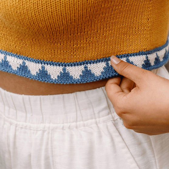 

Bevelled Tank - Mouwloze Intarsia Top
3