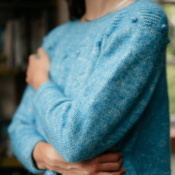 

Adorned Pullover - Trui met Ribbelsteek Pas
5