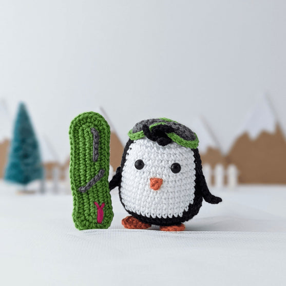 

Brady - De snowboard-pinguïn
6