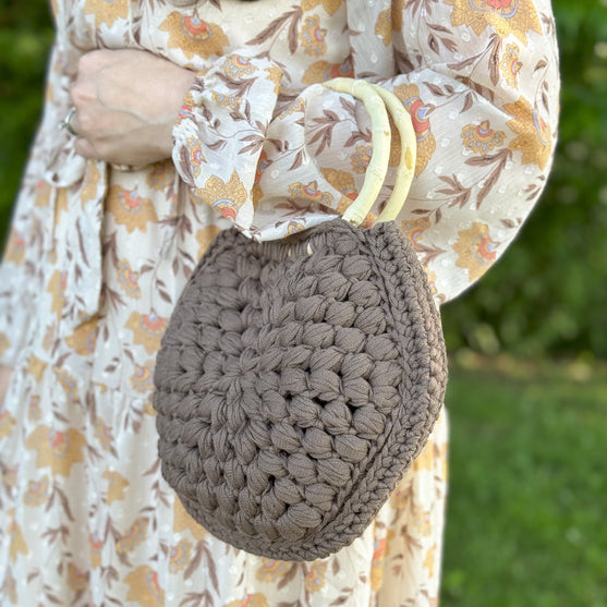 

Lexi Tas - Handtas
2