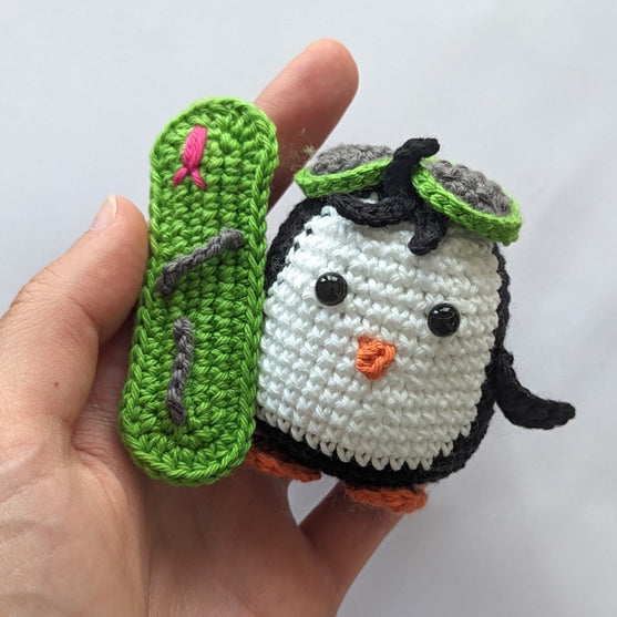 

Brady - De snowboard-pinguïn
2